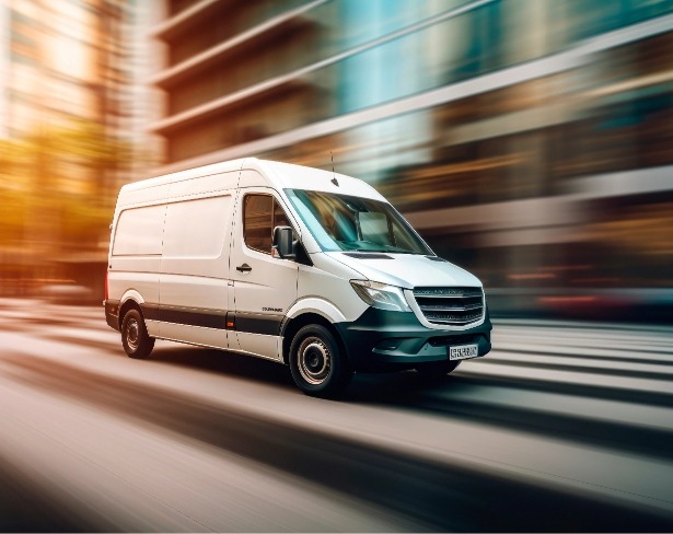 Van driving down street